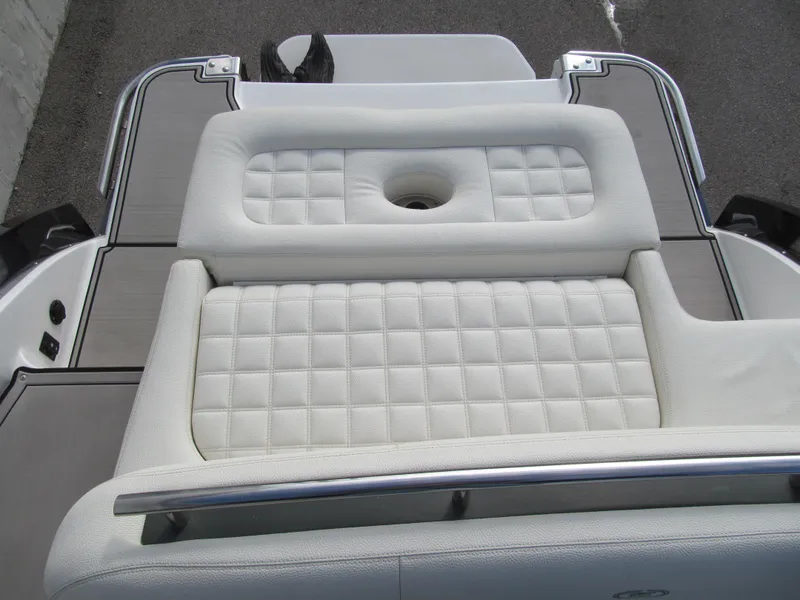 Slide: The Image of 2019 Cobalt R7 Surf boat with cushioned seating and sleek design. - 21