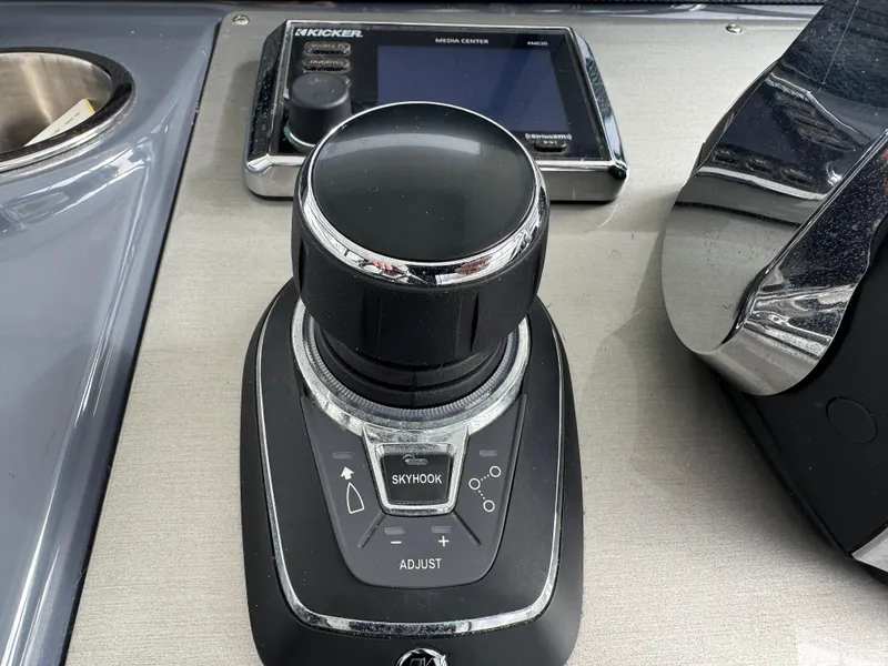 Slide: The Image of Joystick control panel on 2020 Cruisers Yachts 39 Express Coupe. - 24