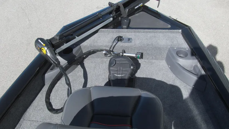 Slide: The Image of 2024 Tracker Pro Team 175 TF boat interior with seating and control panel. - 10