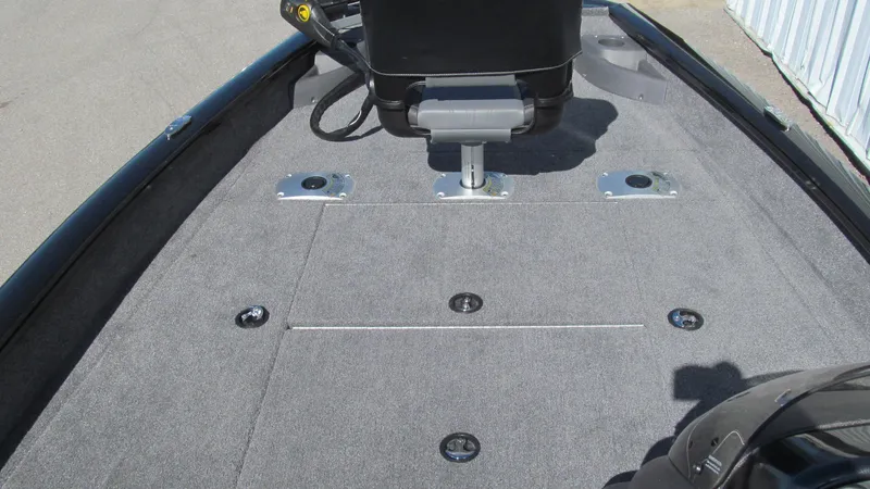 Slide: The Image of 2024 Tracker Pro Team 175 TF boat deck with seating and storage compartments. - 7