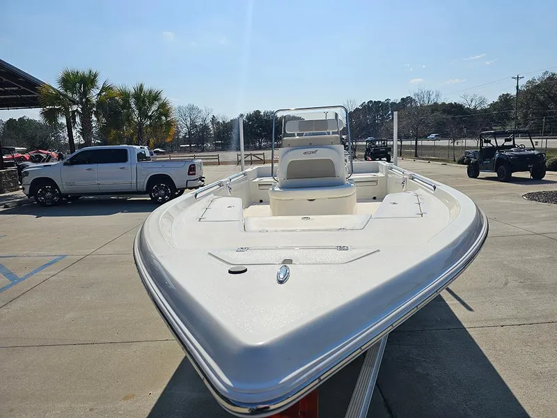 Slide: The Image of 2025 Bulls Bay 2200 XS boat parked outdoors on a sunny day. - 4