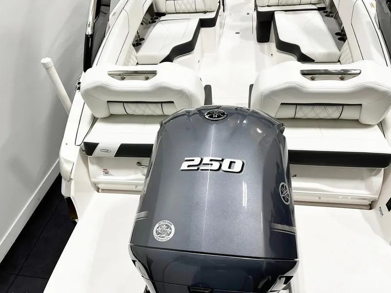 Slide: The Image of 2025 Regal LX4 boat with powerful 250 engine, featuring sleek white seating. - 3