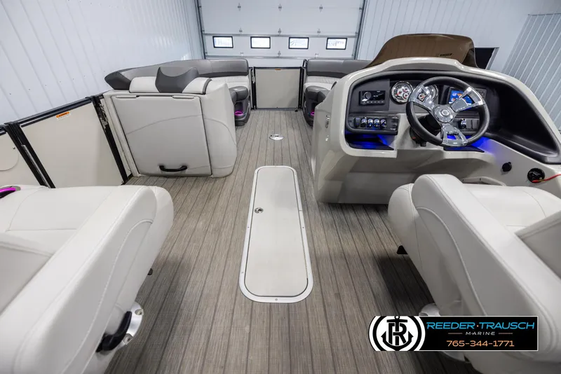 Slide: The Image of Interior of 2021 Avalon Catalina QL pontoon boat with modern dashboard and seating. - 17