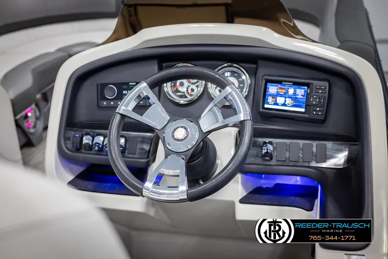 Slide: The Image of Steering console of 2021 Avalon Catalina QL boat with modern controls and displays. - 26