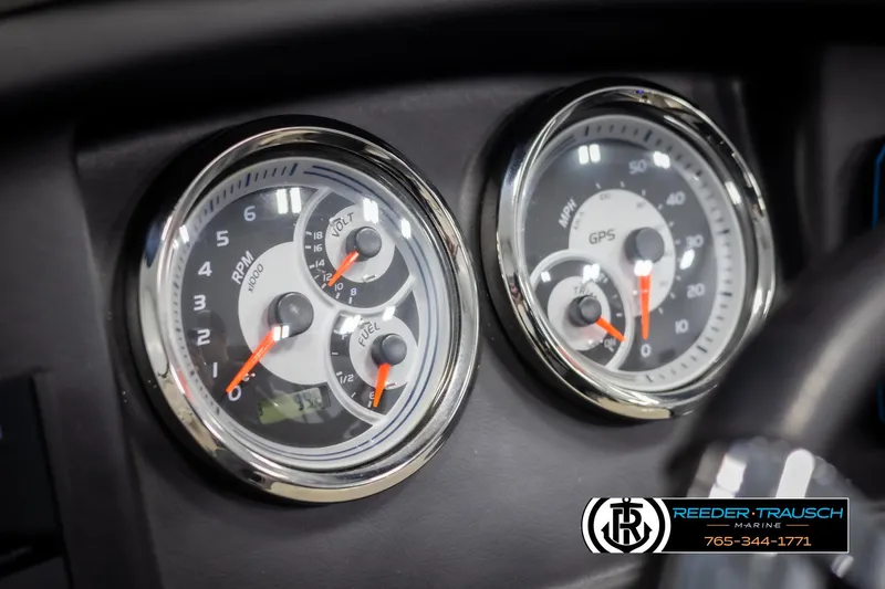 Slide: The Image of Dashboard gauges of a 2021 Avalon Catalina QL boat, featuring RPM and GPS speed indicators. - 31