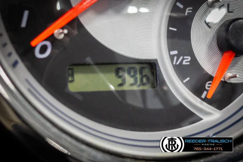 Slide: The Image of Close-up of Avalon Catalina QL 2021 speedometer showing 596 miles, Reeder-Trausch branding visible. - 32