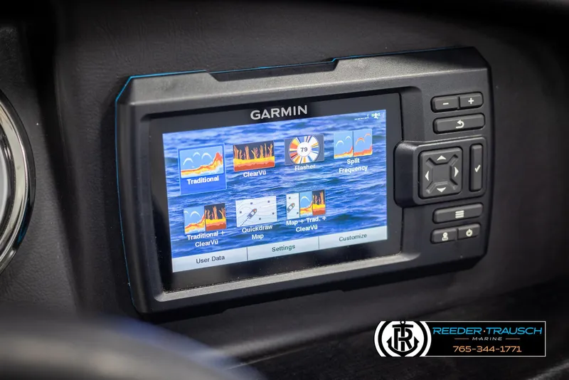 Slide: The Image of Garmin marine display on 2021 Avalon Catalina QL boat dashboard, featuring navigation and sonar options. - 33
