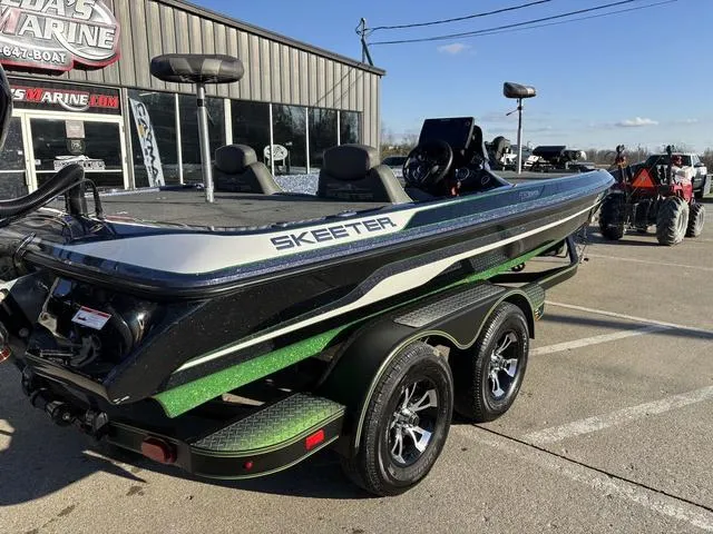 Slide: The Image of 2019 Skeeter ZX250 boat on trailer outside dealership. - 5
