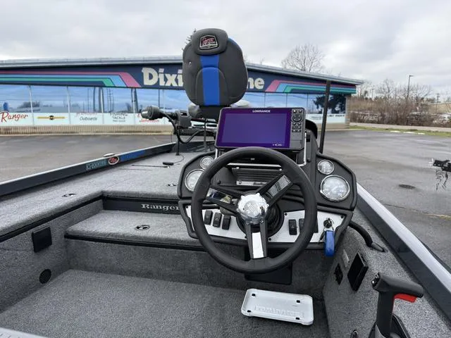 Slide: The Image of 2022 Ranger RT178 boat interior with steering wheel and navigation system. - 3