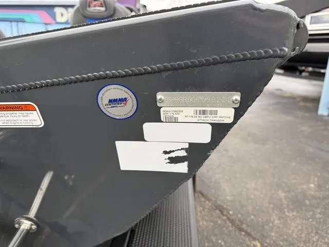 Slide: The Image of 2022 Ranger RT178 boat with certification and warning labels on the hull. - 6