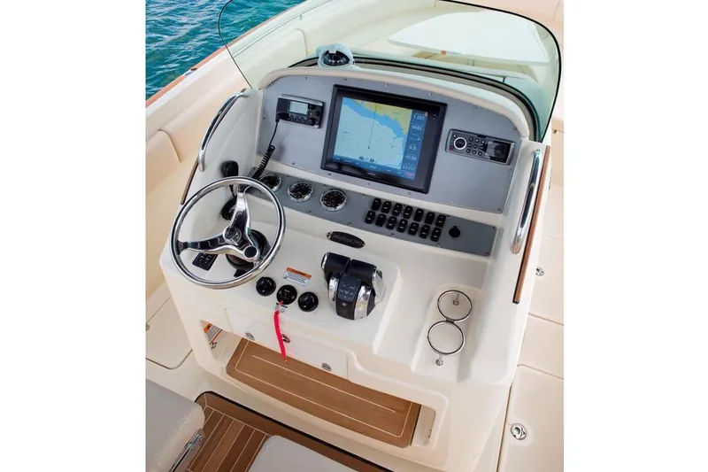 Slide: The Image of 2015 Chris-Craft Catalina 29 boat seats with beige leather and diamond stitching. - 3