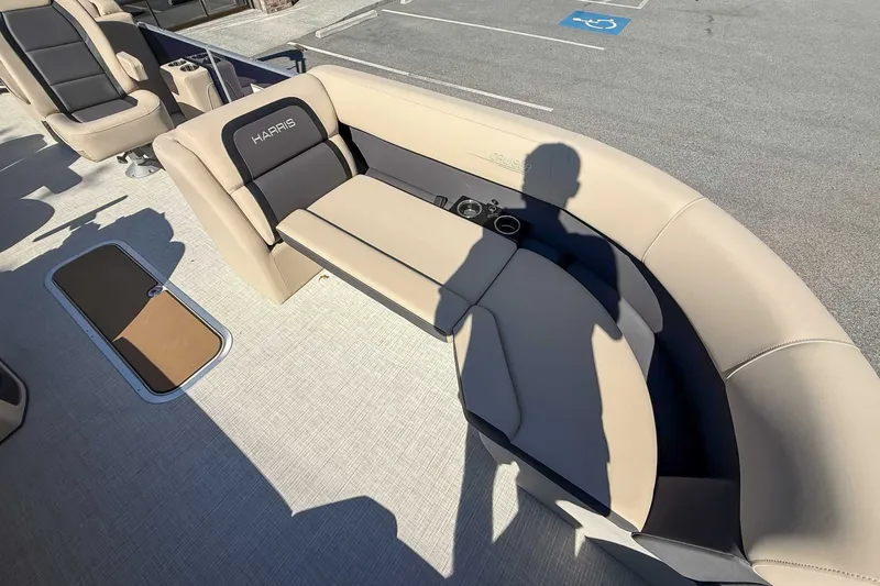 Slide: The Image of Interior of 2025 Harris Cruiser 250 CWDH with beige seating. - 11