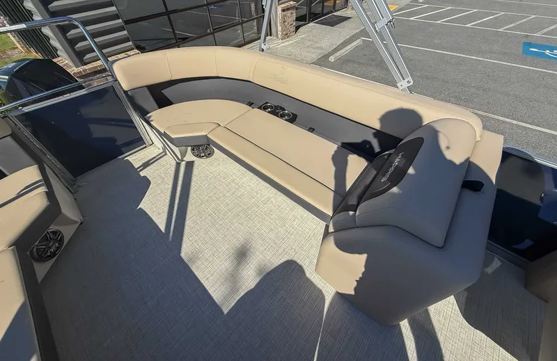 Slide: The Image of Interior of 2025 Harris Cruiser 250 CWDH with beige seating. - 16