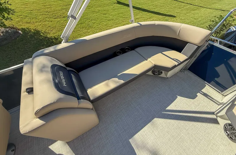 Slide: The Image of Interior of 2025 Harris Cruiser 250 CWDH with beige seating. - 17