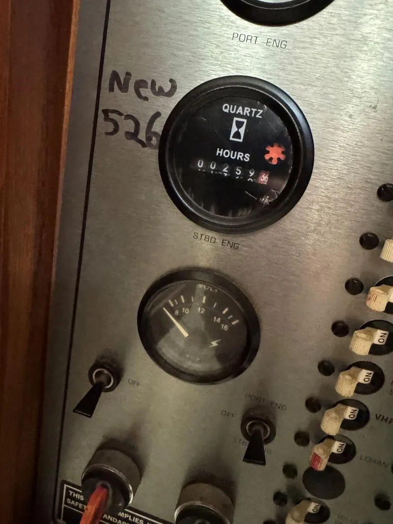 Slide: The Image of Control panel of 1988 Chris-Craft 426 Catalina yacht with engine hour meter. - 39