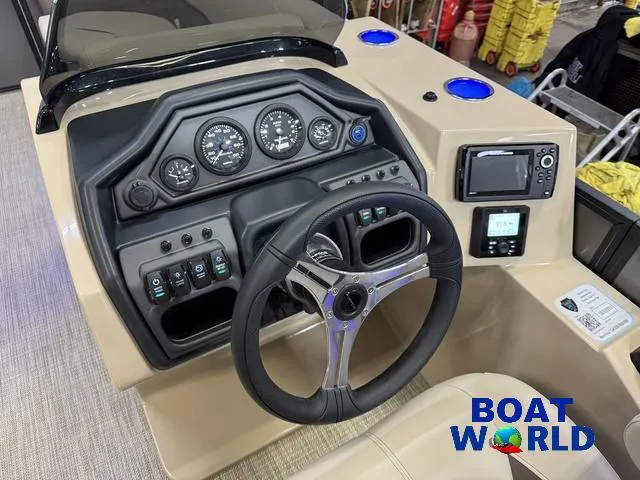 Slide: The Image of 2025 Bentley Pontoons Legacy 223 Navigator Tritoon dashboard with steering wheel and control panel. - 13