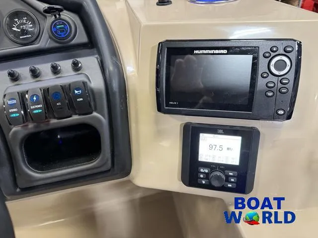 Slide: The Image of Control panel of 2025 Bentley Pontoons Legacy 223 with Humminbird and JBL systems, Boat World logo. - 16
