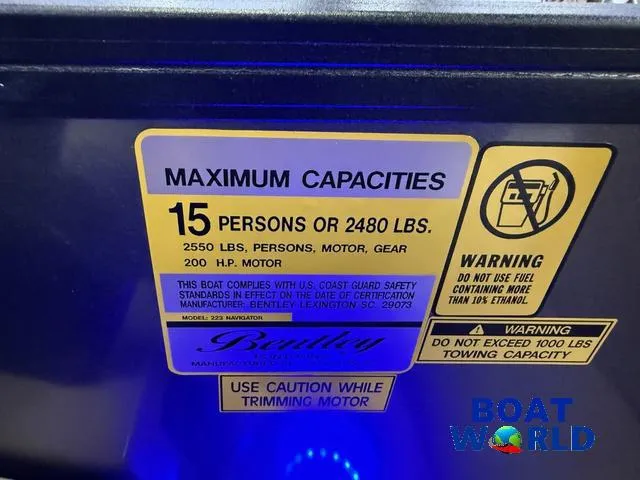 Slide: The Image of 2025 Bentley Pontoons Legacy 223 capacity label, 15 persons or 2480 lbs, safety warnings. - 17