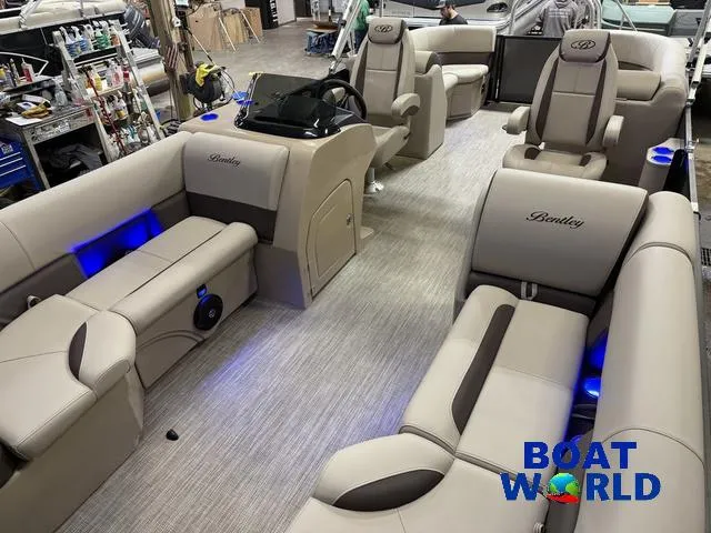 Slide: The Image of 2025 Bentley Pontoons Legacy 223 Navigator interior with luxurious seating and modern design. - 30