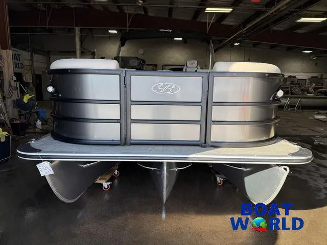 Slide: The Image of 2025 Bentley Pontoons Legacy 223 Navigator Quad Lounge Tritoon in showroom. - 34