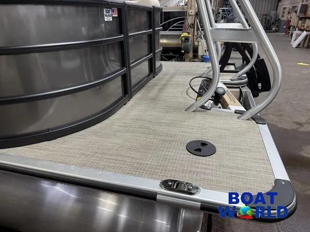 Slide: The Image of 2025 Bentley Pontoons Legacy 223 Navigator Tritoon deck, featuring sleek design and durable materials. - 39