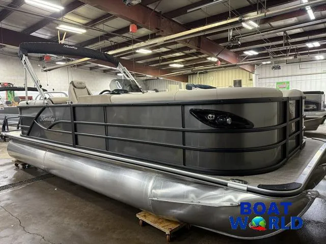 Slide: The Image of 2025 Bentley Pontoons Legacy 223 Navigator Quad Lounge Tritoon in showroom. - 47
