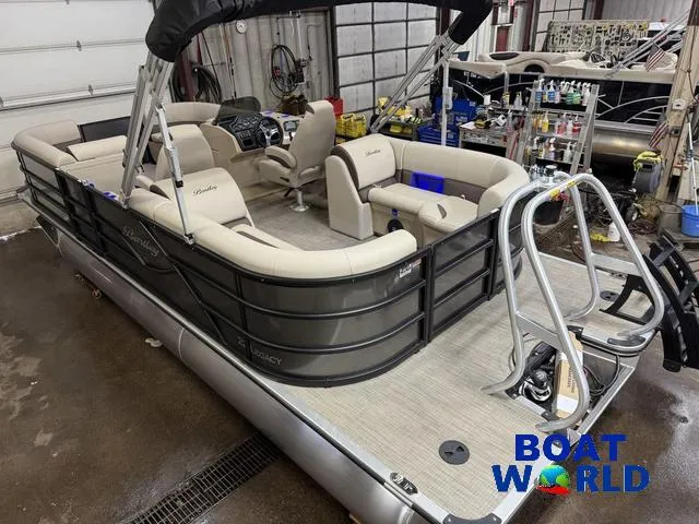 Slide: The Image of 2025 Bentley Pontoons Legacy 223 Navigator Quad Lounge Tritoon in a workshop setting. - 48