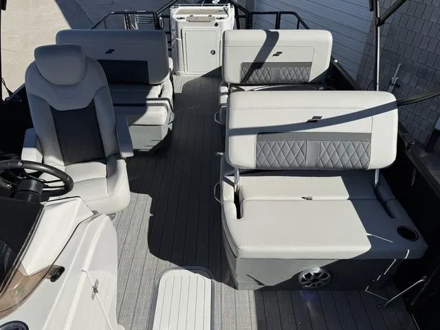 Slide: The Image of 2025 Starcraft CX 23 RL boat interior with luxurious seating and modern design. - 13