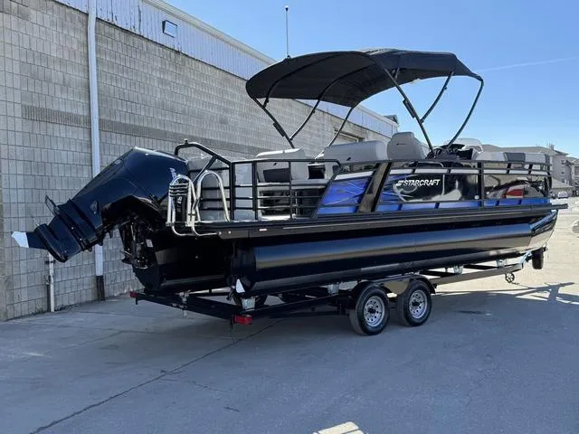 Slide: The Image of 2025 Starcraft CX 23 RL boat with Mercury 300 V8 engine at a showroom. - 3
