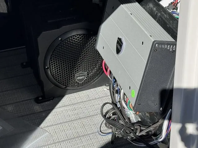 Slide: The Image of Audio system setup in a 2025 Starcraft CX 23 RL boat. - 30