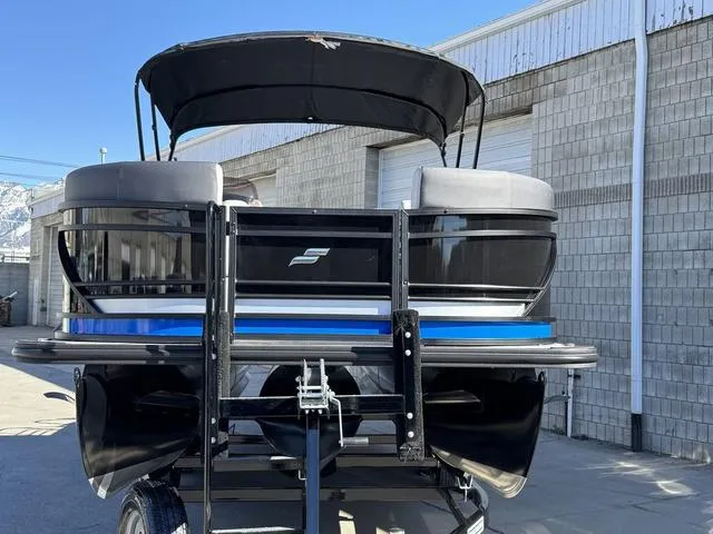 Slide: The Image of 2025 Starcraft CX 23 RL pontoon boat interior with luxurious seating and modern design. - 6