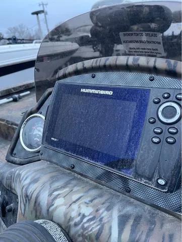 Slide: The Image of 2022 G3 Sportsman 1710 boat dashboard with Humminbird fish finder. - 12