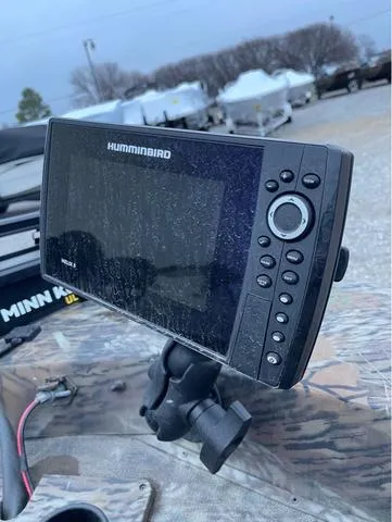 Slide: The Image of Fishfinder on 2022 G3 Sportsman 1710 boat, featuring Humminbird display and camo pattern. - 13