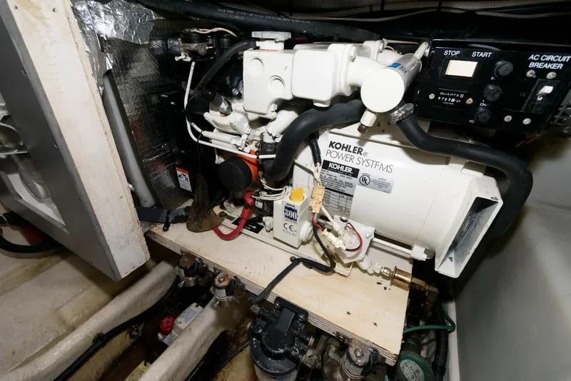 Slide: The Image of Engine room of 2005 Sea Ray 280 Sundancer with Kohler power system. - 18