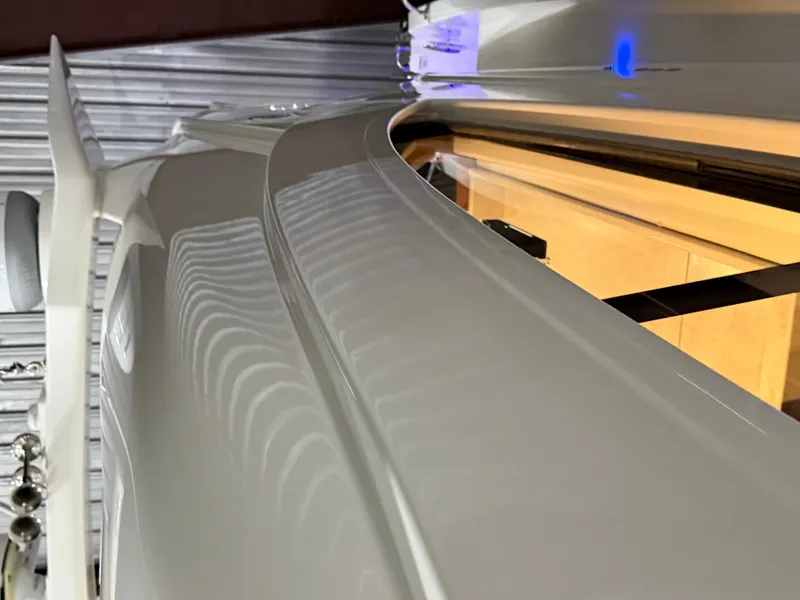 Slide: The Image of Close-up of 2019 Riviera 4800 Sport Yacht's sleek exterior design. - 8