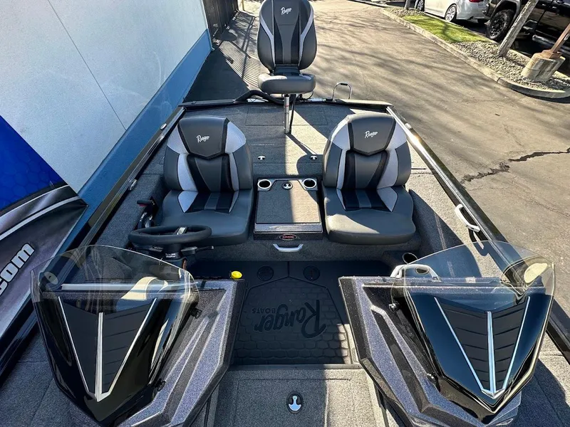 Slide: The Image of 2025 Ranger ALPHA 208 boat interior with dual seats and steering console. - 21