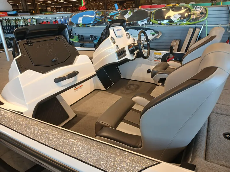 Slide: The Image of Interior of a 2025 Nitro Z18 boat with modern seating and dashboard. - 4