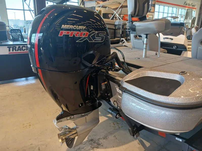 Slide: The Image of 2025 Nitro Z18 boat with Mercury Pro XS outboard motor in showroom. - 6