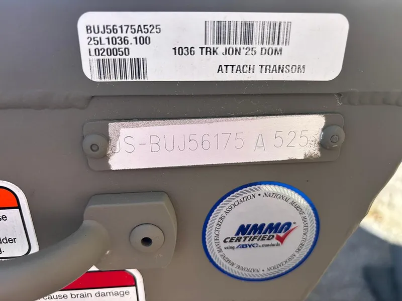 Slide: The Image of 2025 Tracker Grizzly 10 Jon boat identification plate with serial number and NMMA certification sticker. - 3