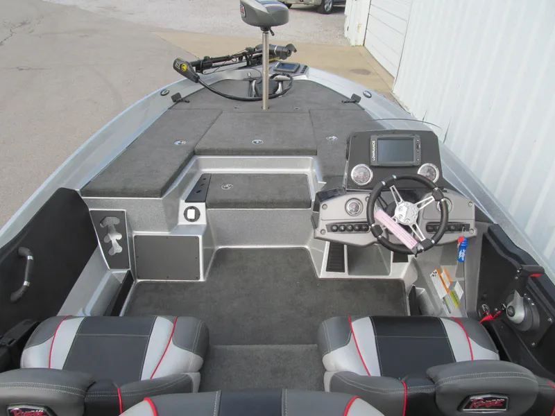 Slide: The Image of 2016 Ranger Z175 boat interior with steering console and seating. - 4
