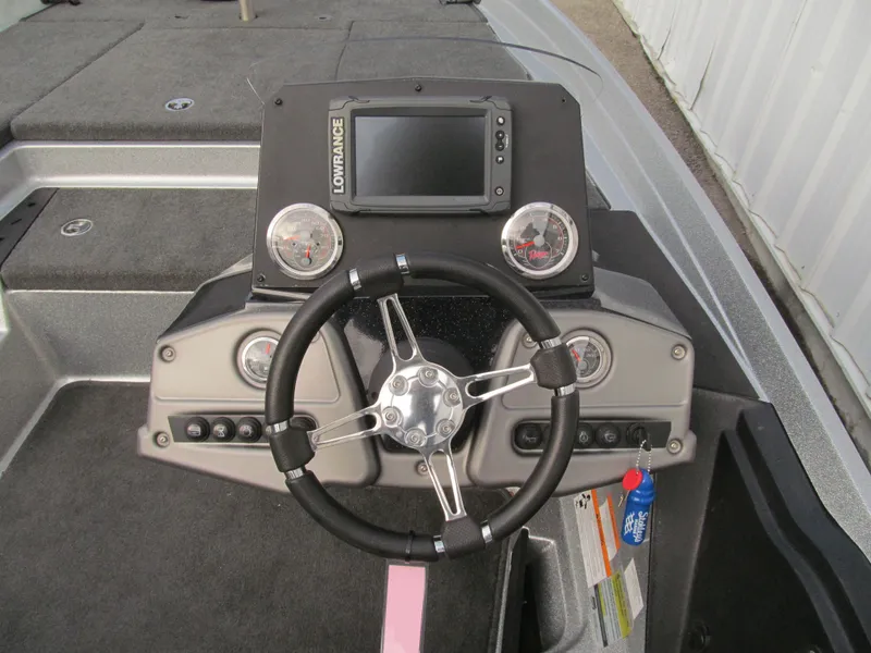 Slide: The Image of 2016 Ranger Z175 boat dashboard with steering wheel and Lowrance display. - 5