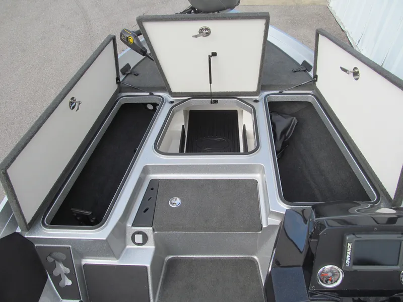 Slide: The Image of 2016 Ranger Z175 boat storage compartments open, showcasing ample space and organized layout. - 7