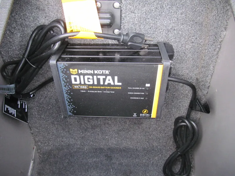 Slide: The Image of Minn Kota digital battery charger in 2018 Tracker Pro Guide V-16 SC boat. - 8