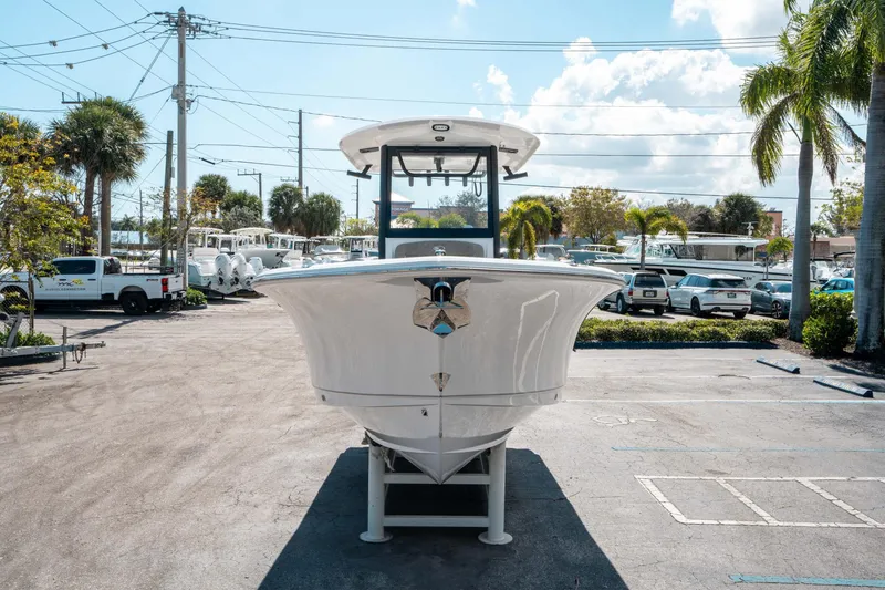 Slide: The Image of 2025 Sea Hunt Gamefish 25 boat displayed in a sunny outdoor setting. - 7