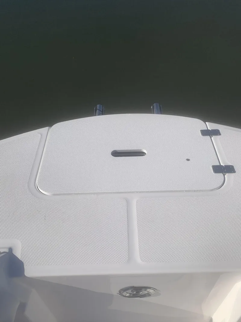 Slide: The Image of 2025 Hurricane SD 2050 boat deck with textured surface and hatch. - 14