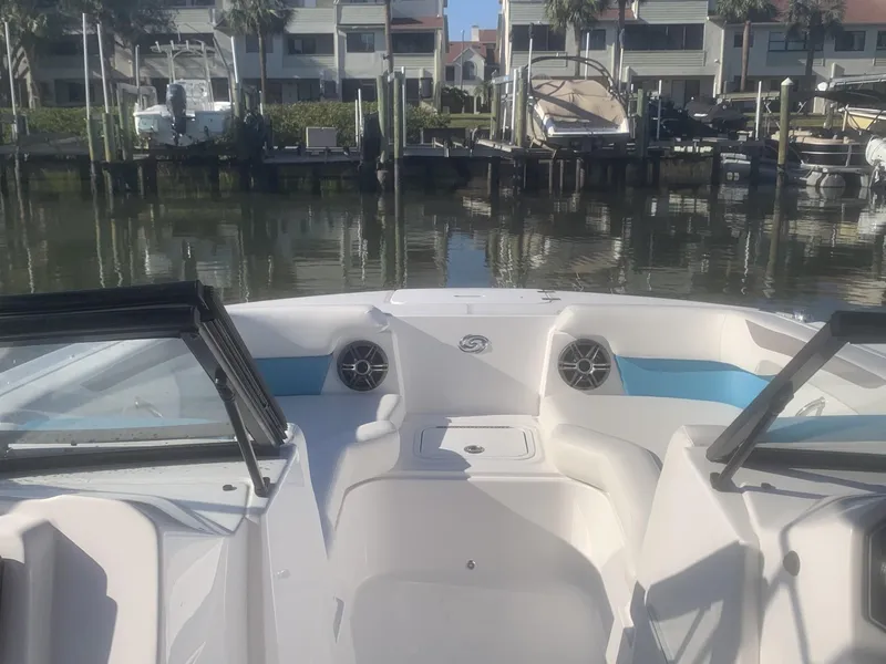 Slide: The Image of Bow view of 2025 Hurricane SD 2050 boat docked in a marina. - 15