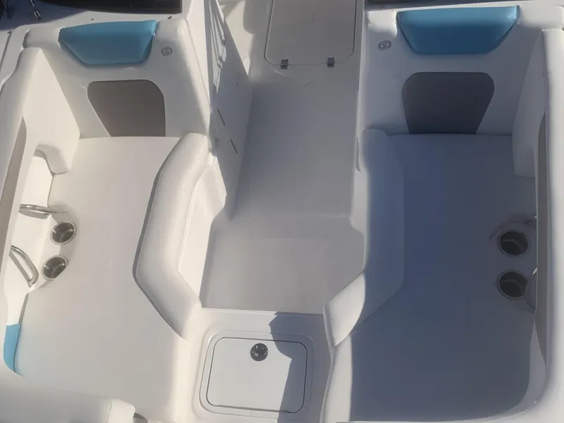 Slide: The Image of 2025 Hurricane SD 2050 boat interior with white seating and blue accents. - 17