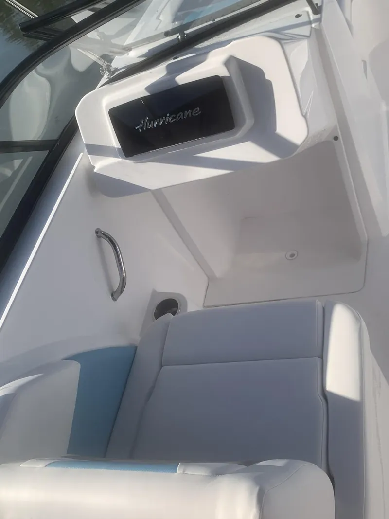 Slide: The Image of 2025 Hurricane SD 2050 boat interior with white seating and sleek design. - 19