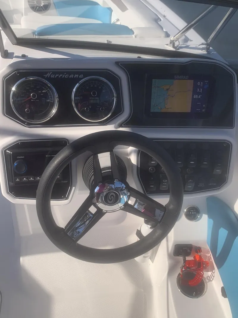 Slide: The Image of Steering console of 2025 Hurricane SD 2050 boat with gauges and navigation display. - 22