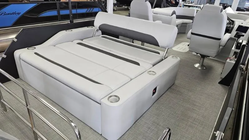 Slide: The Image of 2025 Bentley Pontoons Legacy 223 Swingback interior with luxurious seating and modern design. - 13